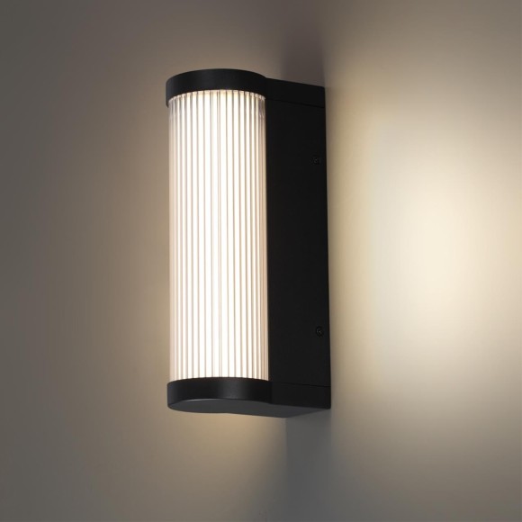 Novotech FLUO 359984 Настенный современный фасадный уличный накладной LED-светильник минимализм с мягким рассеянным светом, 12Вт, 550Лм, 3000К, угол 95°, 220В, IP65, черный алюминий и прозрачный/белый пластик, высота 300 мм, длина 143 мм, ширина 95 мм Novotech FLUO 359984 Настенный современный фасадный уличный накладной LED-светильник минимализм с мягким рассеянным светом, 12Вт, 550Лм, 3000К, угол 95°, 220В, IP65, черный алюминий и прозрачный/белый пластик, высота 300 мм, длина 143 мм, ширина 95 мм