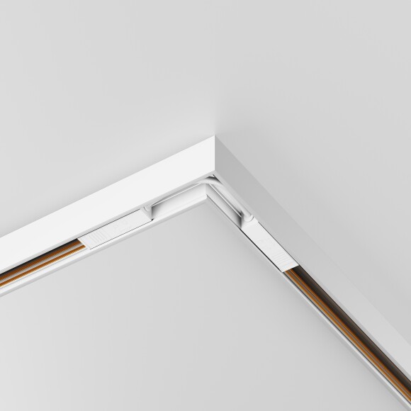 Maytoni Exility-S TRAMN034CL-41W Готовый угловой белый горизонтальный 90° соединитель накладных и подвесных низкопрофильных шинопроводов (треков) серии Exility-S, 100x100x26мм