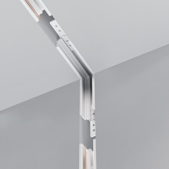 Соединитель угловой вертикальный для низкопрофильного шинопровода в ГКЛ 12.5мм Maytoni Exility TRAM034ICL-42W Соединитель угловой вертикальный для низкопрофильного шинопровода в ГКЛ 12.5мм Maytoni Exility TRAM034ICL-42W